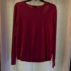 Pink sweater.